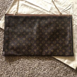 Louis Vuitton attaché case. The material is authentic but reused and designed.